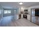 Updated kitchen with stainless steel appliances, granite countertops, and bright lighting at 2625 Williston Dr, Lakeland, FL 33801