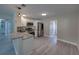 Charming kitchen with stainless steel appliances, granite counters, and new lighting at 2625 Williston Dr, Lakeland, FL 33801