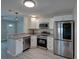 Cozy kitchen featuring stainless appliances, granite counters, and bright lighting at 2625 Williston Dr, Lakeland, FL 33801