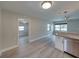 Open-concept living room flows into updated kitchen with natural light at 2625 Williston Dr, Lakeland, FL 33801