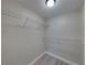 Well-organized walk-in closet featuring wire shelving for optimal storage and a clean, minimalist design at 2625 Williston Dr, Lakeland, FL 33801