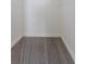 Bright, walk-in closet features neutral carpet, white trim, and plenty of open hanging storage at 30505 Island Club Dr., Deer Island, FL 32778