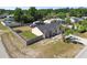 Aerial of a cozy home featuring a fenced backyard and well-maintained lawn at 4889 Myrtle View N Dr, Mulberry, FL 33860
