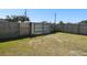 Back gate providing access to the backyard and offering additional security and convenience at 4889 Myrtle View N Dr, Mulberry, FL 33860