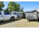 Spacious backyard with a shed and truck, perfect for outdoor activities and storage solutions at 4889 Myrtle View N Dr, Mulberry, FL 33860