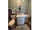 Bathroom featuring a vanity with storage, a single sink, and neutral finishes at 8955 Rhoden Loop W Rd, Fort Meade, FL 33841