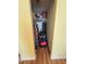 A walk-in closet includes shelving, hanging rack and is well stocked at 8955 Rhoden Loop W Rd, Fort Meade, FL 33841