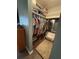 Walk-in closet with organized hanging space, shelving, and ample storage for clothing and accessories at 8955 Rhoden Loop W Rd, Fort Meade, FL 33841