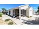 Enclosed screened-in porch perfect for entertaining, providing shade and cool breezes at 2573 Carrington Ct, The Villages, FL 32162