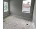 Neutral bedroom space featuring two windows and gray walls at 1205 Eastin Ave, Orlando, FL 32804