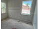 Bedroom under construction featuring two windows and ample natural lighting at 1205 Eastin Ave, Orlando, FL 32804