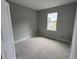 Unfinished bedroom with neutral paint and a large window offering ample natural light at 1205 Eastin Ave, Orlando, FL 32804