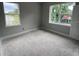 Unfinished bedroom with two large windows offering ample natural light at 1205 Eastin Ave, Orlando, FL 32804