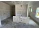 Unfinished spacious kitchen area with large windows for lots of light at 1205 Eastin Ave, Orlando, FL 32804