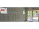 Unfinished room with large windows and sliding glass doors opening to a patio at 1205 Eastin Ave, Orlando, FL 32804