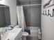 Bathroom featuring a bathtub, shower, toilet, and vanity at 13378 Sw 89Th Ter, Ocala, FL 34473