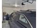 A car parked inside of a clean and organized garage at 13378 Sw 89Th Ter, Ocala, FL 34473