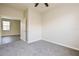 Neutral bedroom featuring plush carpet and a ceiling fan, bright and airy at 1405 Harbor Ridge Dr, Kissimmee, FL 34759
