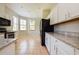 Bright eat-in kitchen with granite counters, tile flooring, and stainless steel appliances at 1405 Harbor Ridge Dr, Kissimmee, FL 34759