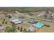 Community center featuring swimming pool, basketball court, playground, and parking at 329 W Aster Ct, Poinciana, FL 34759