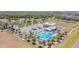 Overhead shot of community pool area, complete with swimming lanes, pool, and shade at 329 W Aster Ct, Poinciana, FL 34759