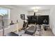 Home gym featuring exercise equipment and natural light at 329 W Aster Ct, Poinciana, FL 34759