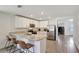 Kitchen featuring stainless steel appliances and a granite breakfast bar at 329 W Aster Ct, Poinciana, FL 34759