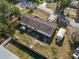 Aerial view of the backyard showcasing a shed, and grassy area at 4795 Myrtle View W Dr, Mulberry, FL 33860