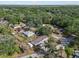 A high angle view of a neighborhood with lush foliage, homes, and clear streets at 4795 Myrtle View W Dr, Mulberry, FL 33860