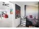 Hallway view displays modern wall art, access to bedrooms, and convenient storage at 4795 Myrtle View W Dr, Mulberry, FL 33860