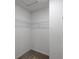Walk-in closet featuring neutral carpet and wire shelving at 603 Bay Leaf Dr, Poinciana, FL 34759