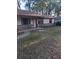 Charming single-story home featuring brick accents and a well-maintained front yard at 3400 Ne 43Rd Pl, Ocala, FL 34479