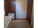 Bright laundry area with tile floor and utility connections at 3400 Ne 43Rd Pl, Ocala, FL 34479