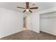 Bedroom boasts soft carpet, ceiling fan, closet and lots of natural light at 803 Mccranie Rd, Lakeland, FL 33809