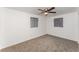 Bright bedroom with neutral carpet and modern ceiling fan provides comfort at 803 Mccranie Rd, Lakeland, FL 33809