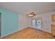 Bright dining room featuring wood floors and an access door to the lanai at 9210 Lehall W Sq, Lakeland, FL 33810