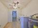 Functional laundry room with appliances, connecting to other areas of the home at 9210 Lehall W Sq, Lakeland, FL 33810