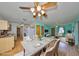 Bright, open living area with modern decor, and seamless flow to the kitchen at 9210 Lehall W Sq, Lakeland, FL 33810