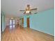 The wide-open floor plan features laminate floors and provides an airy and bright atmosphere at 9210 Lehall W Sq, Lakeland, FL 33810