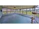 Large screened-in porch, perfect for relaxing and enjoying the outdoors at 9210 Lehall W Sq, Lakeland, FL 33810