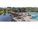The community pool has ample seating and a clubhouse in this lakeside community at 748 Terrapin Dr, Debary, FL 32713