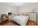 This cozy bedroom features wood laminate flooring and lots of storage at 4014 Gallagher Loop, Casselberry, FL 32707