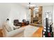 Living room boasts tall ceilings, a skylight, a brick fireplace and neutral colors at 4014 Gallagher Loop, Casselberry, FL 32707
