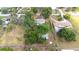 Extensive lot with a charming home, mature trees, and a separate garage area, offering a blend of comfort and outdoor space at 7220 Pinehaven Dr, Lakeland, FL 33810