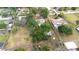 Large lot with a home, a detached garage, and mature trees providing shade and privacy in a desirable neighborhood at 7220 Pinehaven Dr, Lakeland, FL 33810