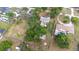 Spacious property featuring a well-maintained home with a pool, large trees, and ample yard space for outdoor enjoyment at 7220 Pinehaven Dr, Lakeland, FL 33810