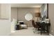 Stylish home office setup with dual monitors, comfortable chair, and modern decor at 1321 Acorn Meadow Loop, Eustis, FL 32726
