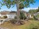 Inviting single Gathering home with a lush front lawn and driveway leading to garage at 146 Bayswater Ln, Davenport, FL 33897