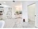 Luxurious bathroom boasting a marble shower, dual vanities, and stylish tile work for a spa-like experience at 2735 Berkford Cir, Lakeland, FL 33810