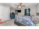 Bedroom with a ceiling fan and views to the outside at 350 N 1St Ave, Bartow, FL 33830